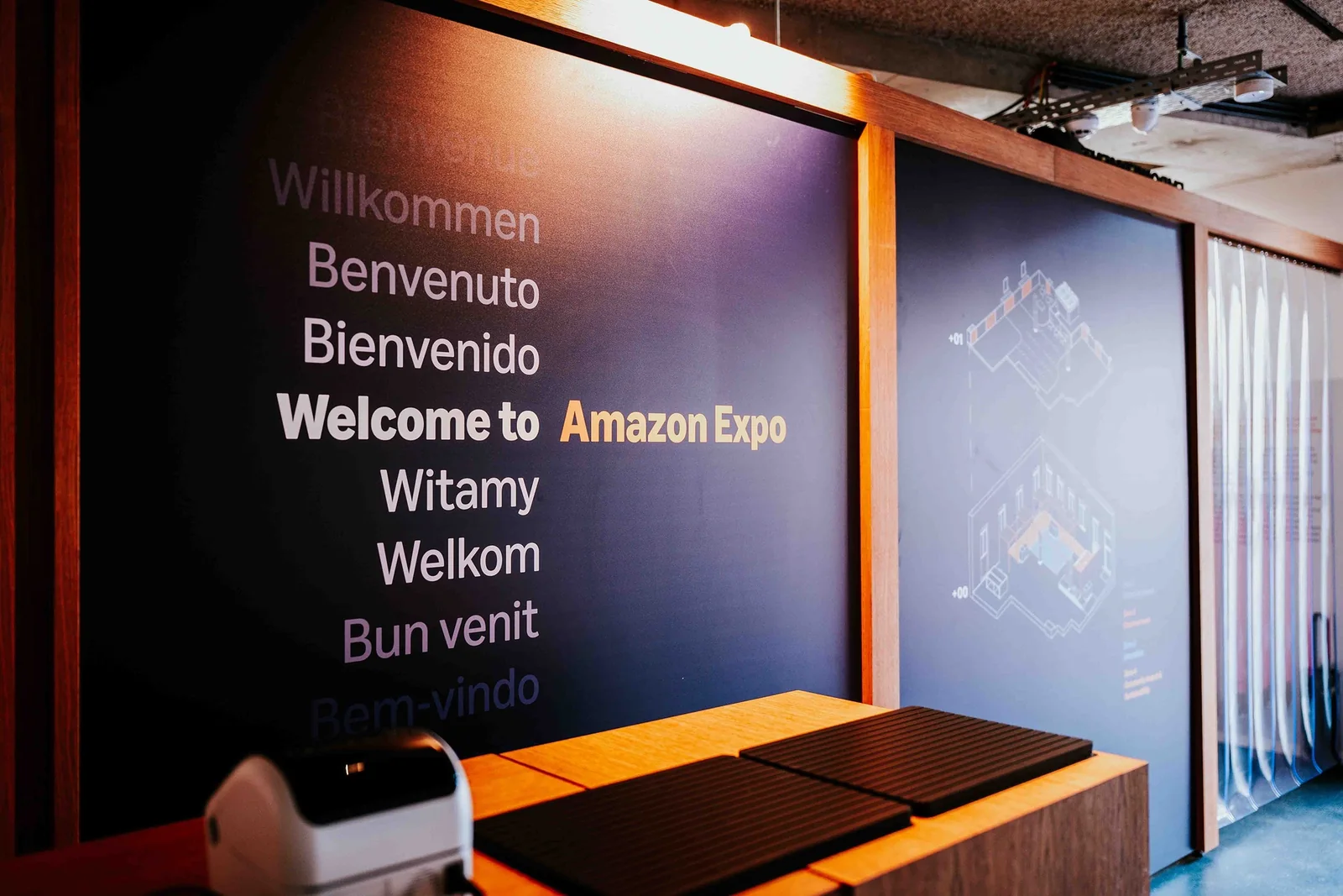 A welcome wall greeting visitors in several languages