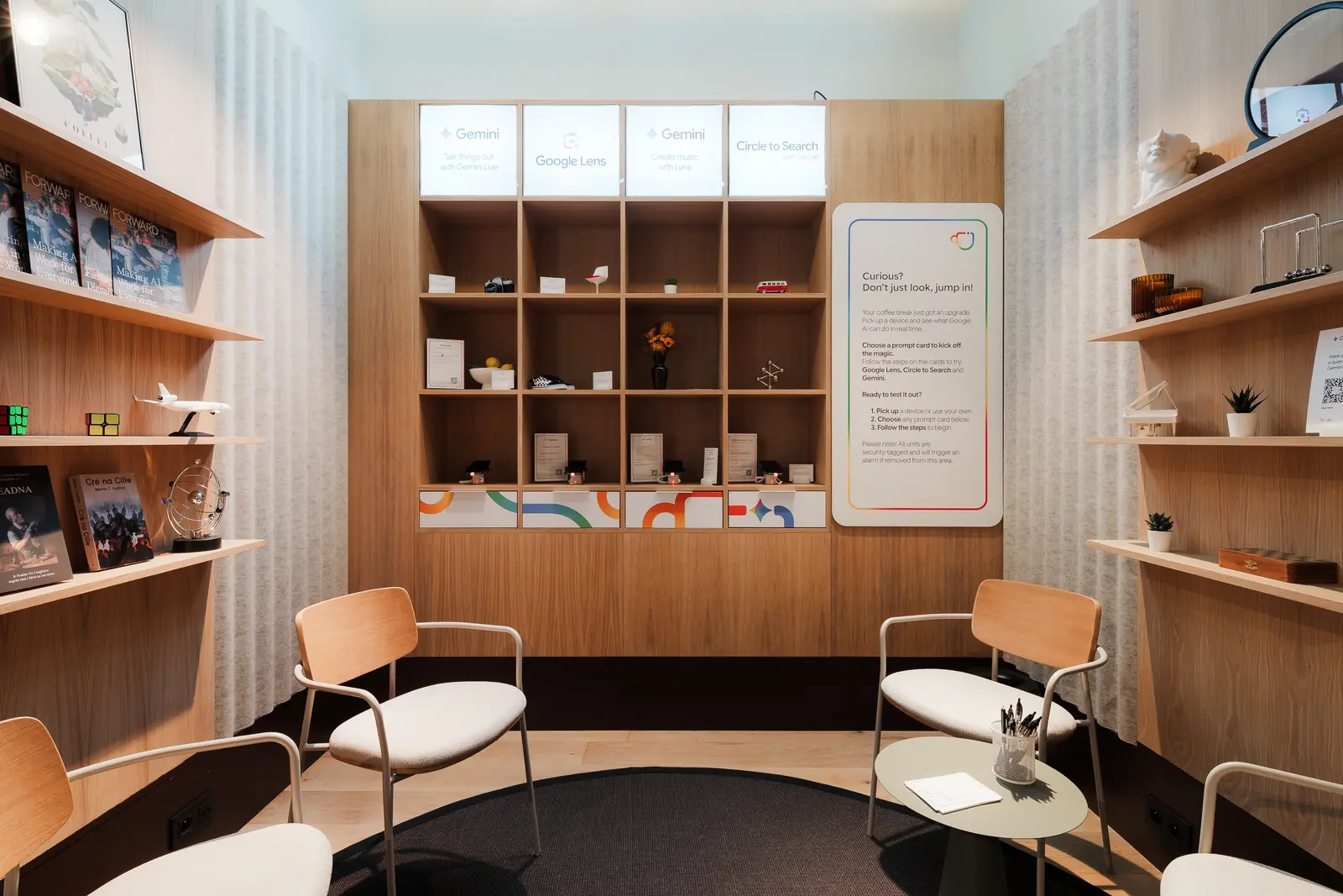 A demo nook with shelving, printed cards and seating