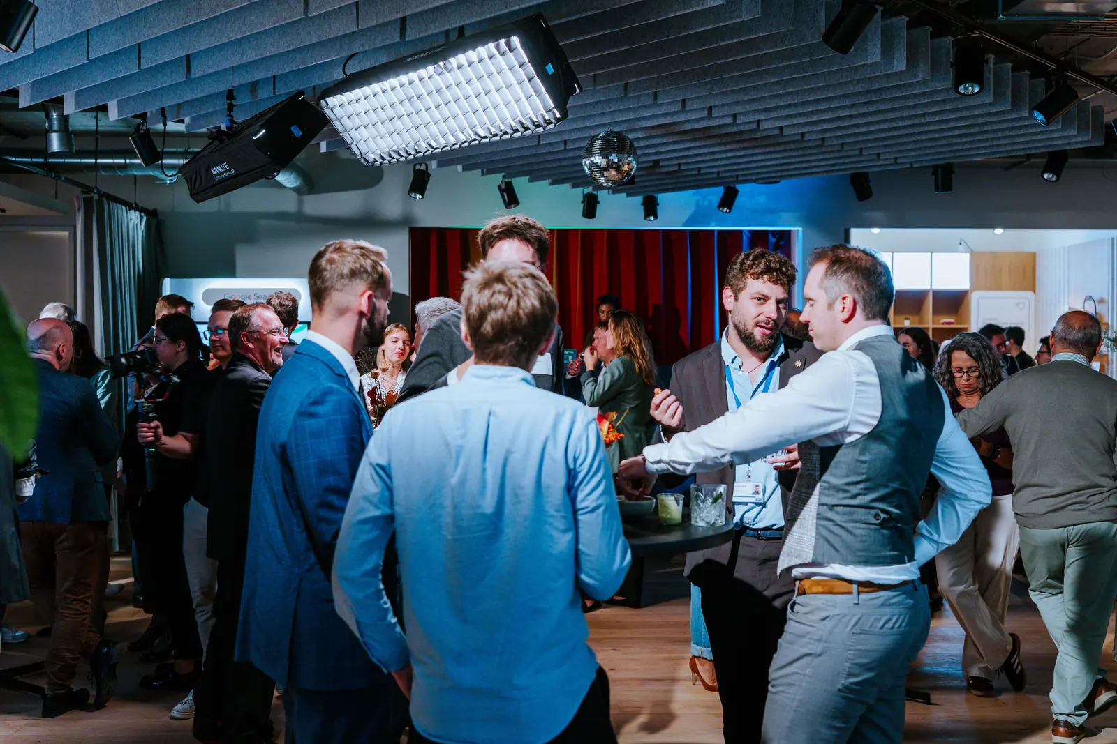 Guests talking during an evening reception